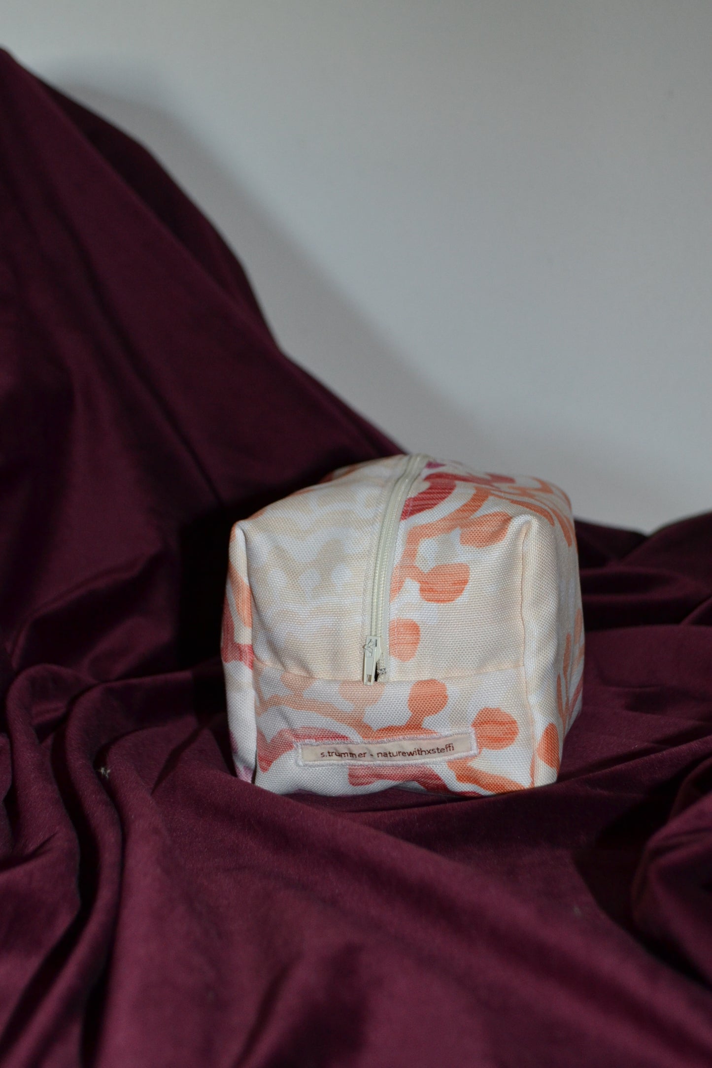 Kosmetiktascherl rot-orange Musterstoff